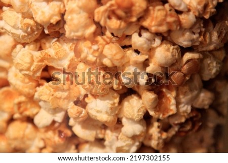 Bronzed popcorn closeup. Selective focus. High quality photo