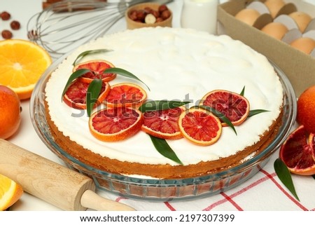 Concept of tasty dessert with meringue pie with citrus, closeup