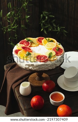 Concept of tasty dessert, meringue pie with citrus