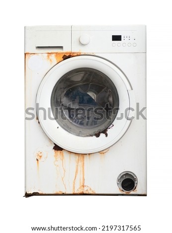 Old rusty broken washing machine isolated on white background. Royalty-Free Stock Photo #2197317565