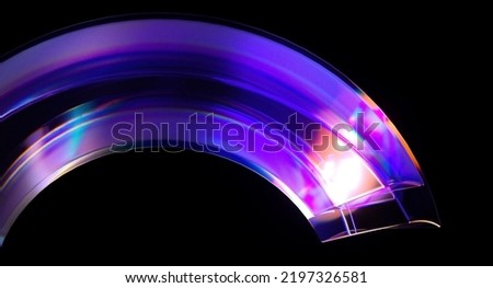 A colorful neon curly geometry shape on a black background 3d