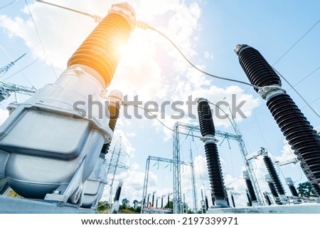 Modern new power station. The equipment used to raise or lower voltage, high voltage power station. Electrical Transformer Royalty-Free Stock Photo #2197339971