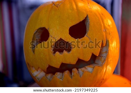 Halloween pumpkin. Scary halloween pumpkin indoor. Helloween concept