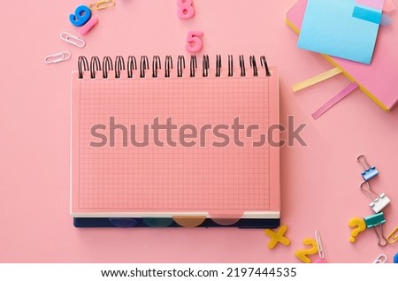 School supplies accessories stationery and notebooks on pink background, flat lay, top view. Education stuff supplies accessories discount sales. Back to school, get ready for learning. Flatlay above.