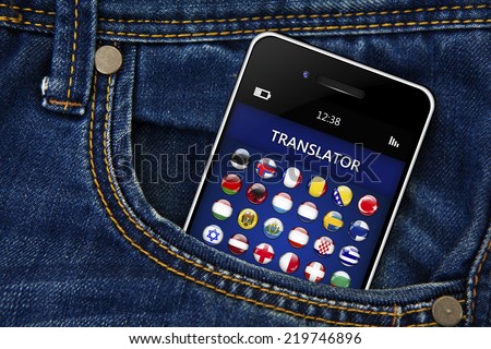 mobile phone with language translator application in jeans trousers pocket