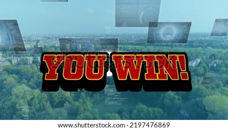 Image of you win text and data processing over cityscape. social media and communication interface concept digitally generated image.
