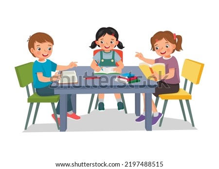 Group of elementary students kids studying together, doing homework, reading, and discussing school projects around the table
