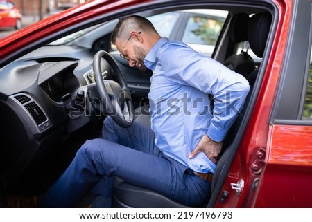 Back Pain Car Driving Injury And Tired Royalty-Free Stock Photo #2197496793