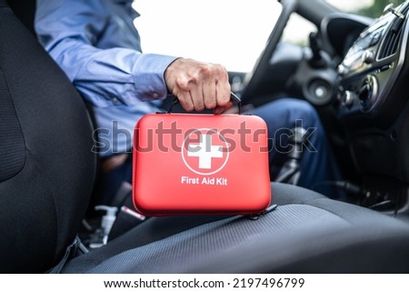 First Aid Kit In Car. Medical Health Royalty-Free Stock Photo #2197496799