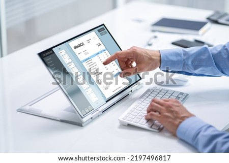 Digital Electronic Bill And Accountant E Invoice On Laptop Royalty-Free Stock Photo #2197496817