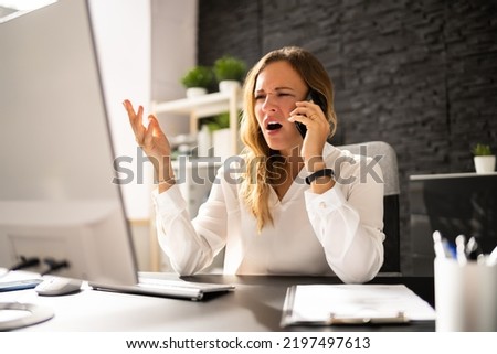 Unhappy Woman Customer Speaking With Service Company Royalty-Free Stock Photo #2197497613