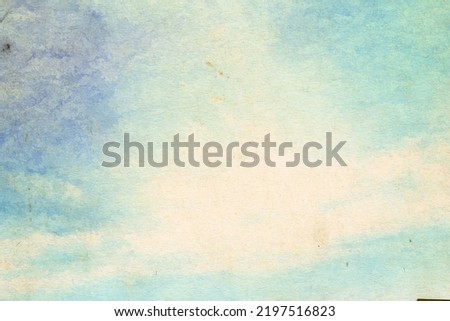 retro sky painting pattern on old paper texture. vintage watercolor clouds. Royalty-Free Stock Photo #2197516823