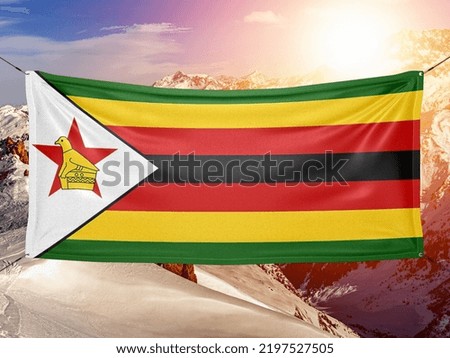 Zimbabwe national flag cloth fabric waving on beautiful background.