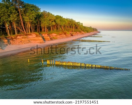 Beach at sunrise on Baltic sea in Poland, Europe