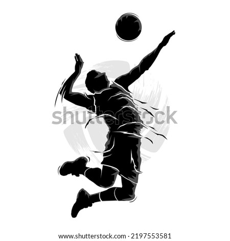 Silhouette of male volleyball player jumping to hit the ball