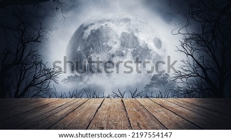 Spooky Halloween background with empty wooden boards, dark horror background. Holiday theme, copy space for text. Perfect for product placement