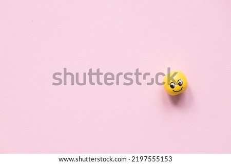 yellow smile on pink background