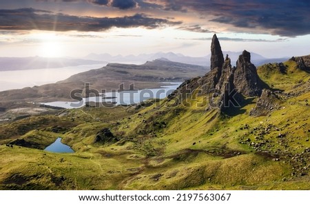 Mountain panorama with sun in Scotland, Isle of Skye - Old man of storr Royalty-Free Stock Photo #2197563067