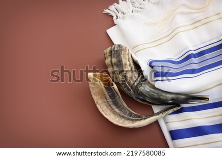 religion image of shofar (horn) on white prayer talit. Rosh hashanah (jewish New Year holiday), Shabbat and Yom kippur concept Royalty-Free Stock Photo #2197580085