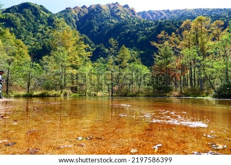 Chubu-Sangaku National Park.This place is Tashiro-ike Pond in Kamikochi.Matsumoto,Nagano,Japan.Early October.