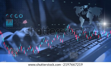 Stock exchange market economy financial dark theme, global business investment. Trader hand close up typing, trading stock market, candle stick graph chart. Royalty-Free Stock Photo #2197667219