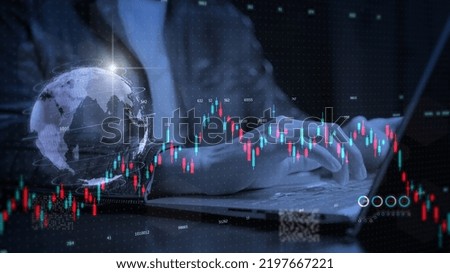 Stock exchange market economy financial dark theme, global business investment. Trader hand close up typing, trading stock market, candle stick graph chart. Royalty-Free Stock Photo #2197667221