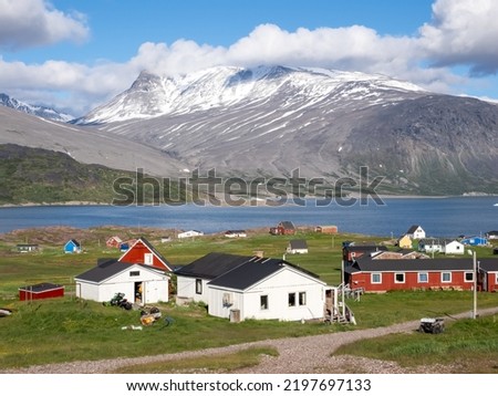 View of Igaliku in southern Greenland. A settlement with just a few dozen inhabitants. Famous for its Norse ruins of Garðar and its unique farming sites at the edge of the ice cap. Royalty-Free Stock Photo #2197697133