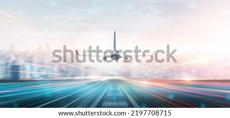 Technology digital future of commercial air transport concept, Airplane taking off from airport runway on city skyline and world map background with copy space, Moving by speed motion blur effect Royalty-Free Stock Photo #2197708715