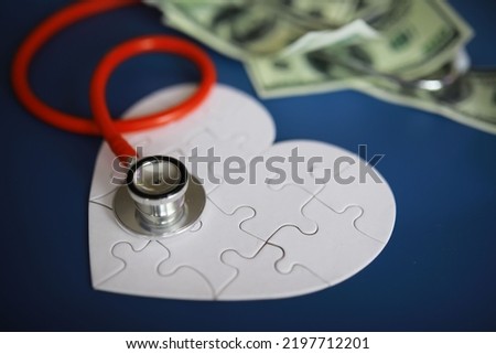 Stethoscope on money background - medical concept 