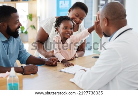 High five, doctor and family with a girl and her parents at the hospital for consulting, appointment and healthcare. Medicine, trust and support in a medical clinic with a health professional Royalty-Free Stock Photo #2197738035