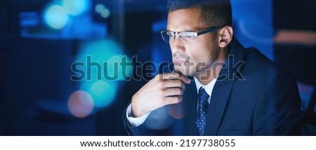 Businessman working, thinking and planning at night in a corporate company office. Networking for global communication or an international deal across time zones while trading with data and analytics Royalty-Free Stock Photo #2197738055