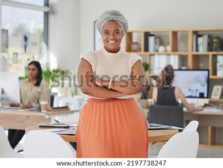 Innovation, leadership and a proud black business woman standing in power in a corporate office. Happy African American leader excited by successful goal management with diverse female employees Royalty-Free Stock Photo #2197738247