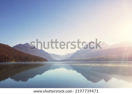 Beautiful Bowman lake with reflection of the spectacular mountains in Glacier National Park, Montana, USA.