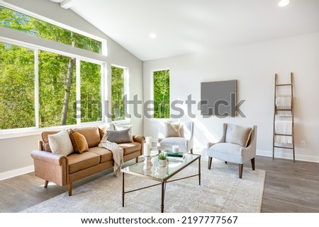 interior living room with bright clean white walls airy green forest view and minimalist furnishings