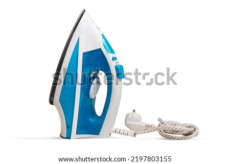 Steam iron isolated on a white background Royalty-Free Stock Photo #2197803155