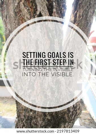 Inspirastional motivational quotes. Setting goals is the first step in turning the invisible into the visible in nature background.
