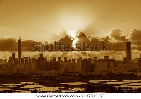 Skyline of Shenzhen city, China under sunset. Viewed from Hong Kong border