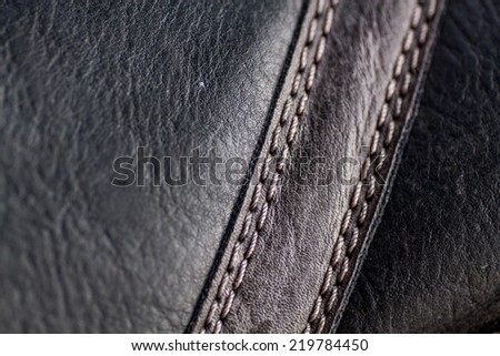 Detailed seam on leather texture Royalty-Free Stock Photo #219784450