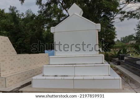 Cemetery tombstones with various designs, textures, colors, sizes and shapes