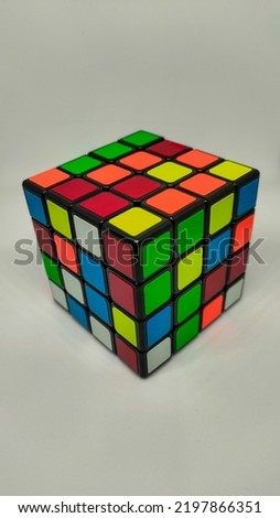 Rubic cube of multiple color isolated on black banckground.