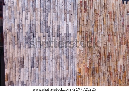 Stone wall flooring ceramic tile, faience patterns, texture, background. Bamboo stone wall ceramic brown colour.