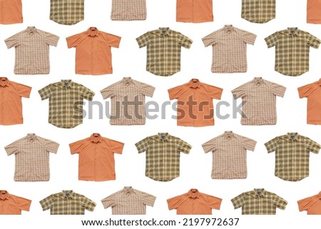 Seamless pattern from clothes. Decorative background from clothes.