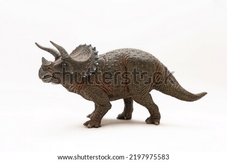 Triceratops Dinosaur Toy isolated on White background. Realistic Triceratops Dinosaur Figurine Royalty-Free Stock Photo #2197975583