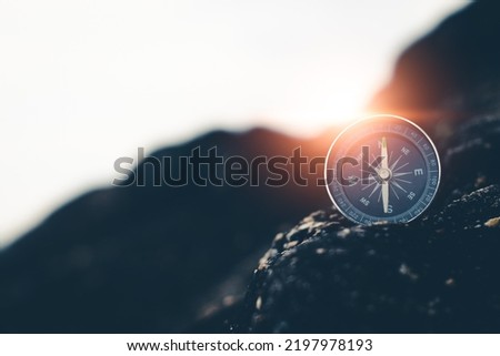 Travel of tourists with compass. compass of tourists on mountain. Royalty-Free Stock Photo #2197978193