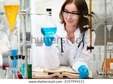 Chemist works in hospital pharmacology science research lab. Woman medical scientist or researcher analyzing innovative virus protective vaccines in health care biology laboratory. Medicine discovery.