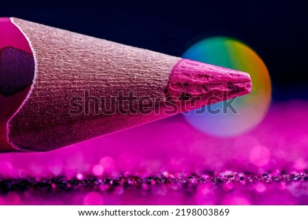 Lilac sharpened pencil tip closeup. Deep purple pencil closeup. Sharpened deep purple pencil macro view. Pencil in macro Royalty-Free Stock Photo #2198003869