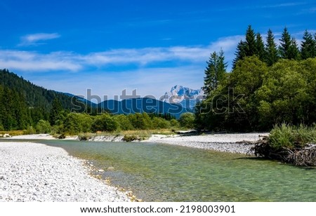 Mountain river in river valley. River valley in Europe. Landscape in Swiss mountain Royalty-Free Stock Photo #2198003901