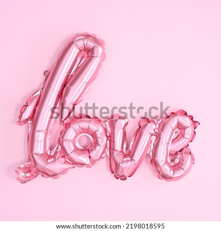 Love balloon for Valetine's day holidays o pastel pink background. Flat lay Royalty-Free Stock Photo #2198018595