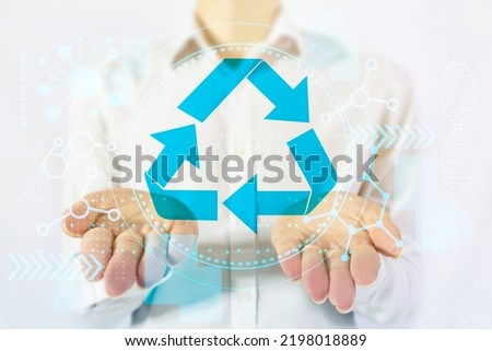 Reusing and recycling for future environmental stewardship social responsibility Royalty-Free Stock Photo #2198018889