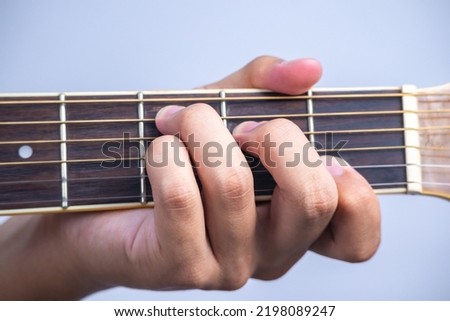 C7 chord ,how to arrange guitar chords, beginner guitar, stringed music , minor major basic and close up finger on flat Royalty-Free Stock Photo #2198089247